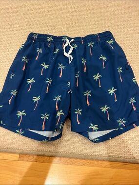 Men's Chubbies Navy Palm Tree Swim Trunks
Size: XL